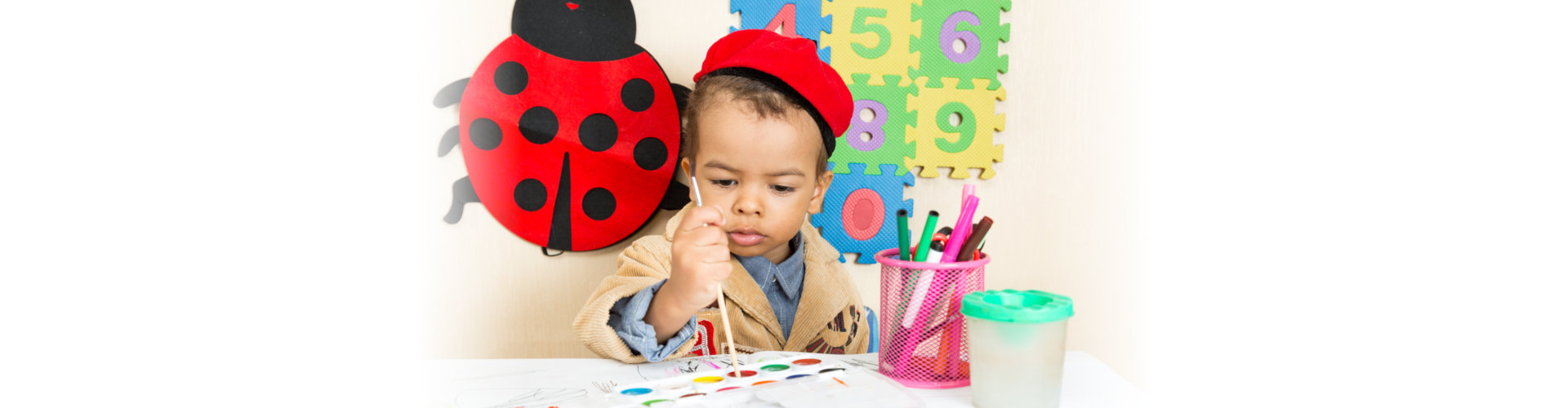 a toddler learning to draw